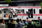 Indonesia commuter train crash toll rises to 14 as rescuers complete evacuation